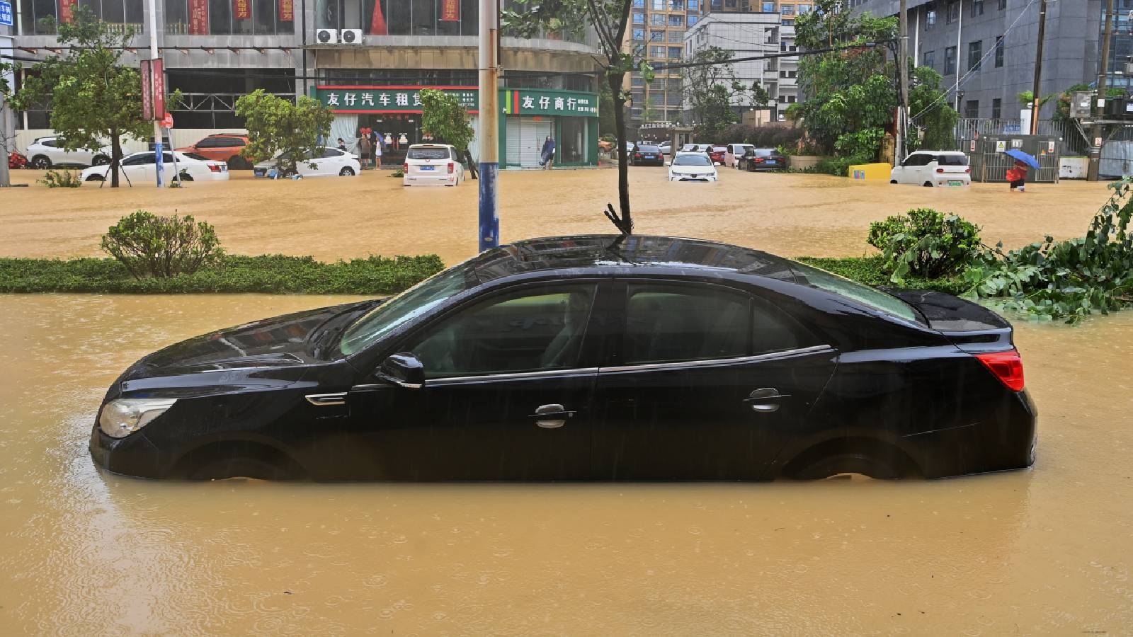 A landslide in China buries 33 people, with about half of them rescued, state media report