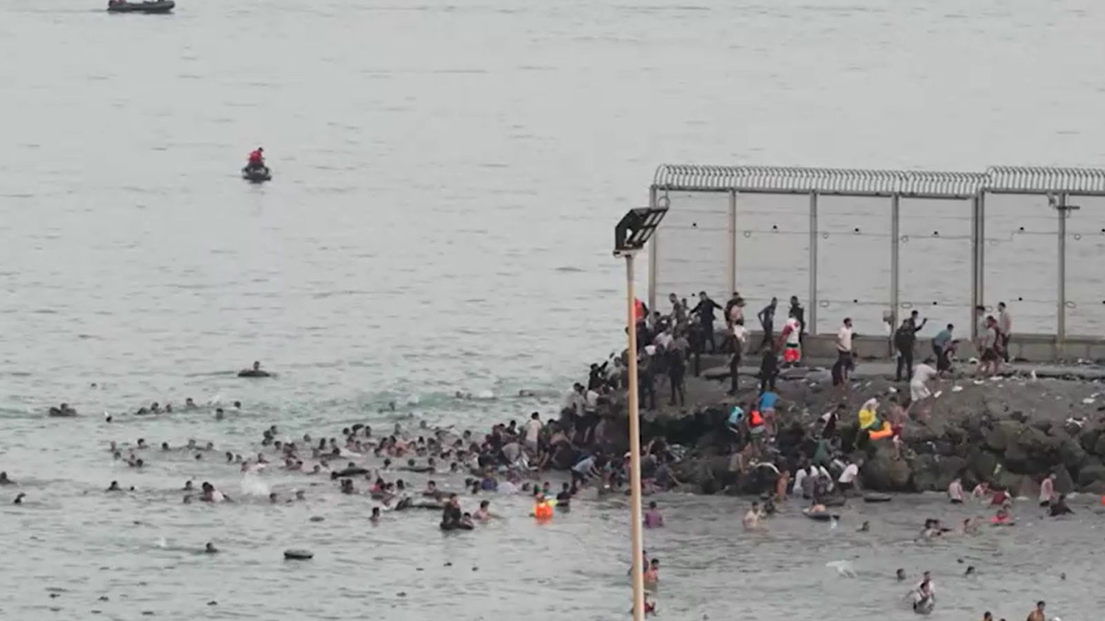 Spain deploys military to Ceuta border after thousands cross from Morocco