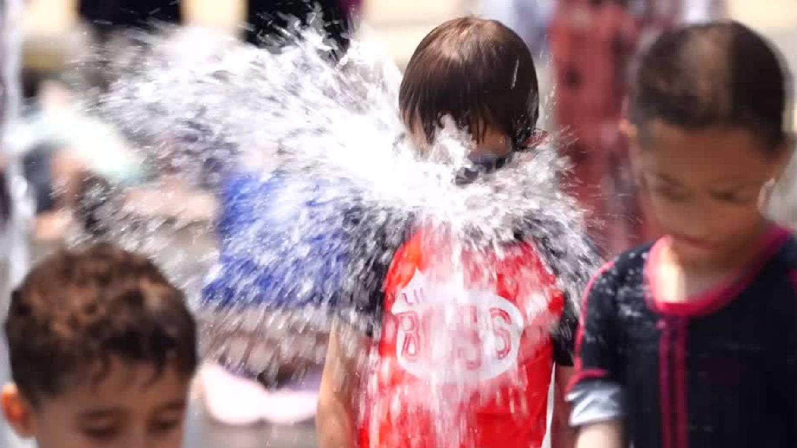 "It's boiling hot," people in Iran, Jerusalem seek watery refuge from heatwave