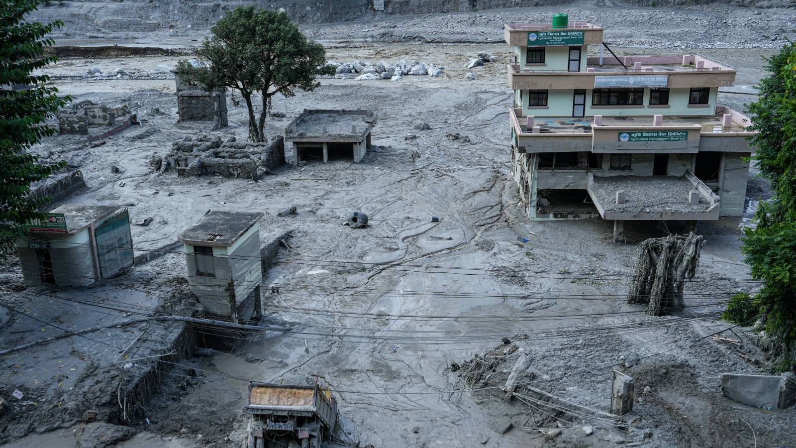 Glacial collapse or landslide dam? Scientists investigate Nepal flood trigger