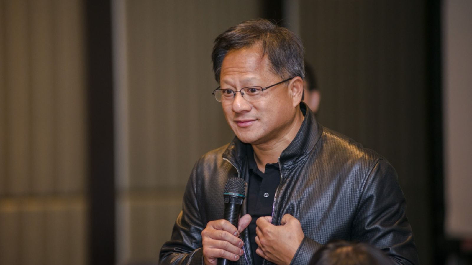 Nvidia's Jensen Huang dismisses AI extinction fears, backs faster development