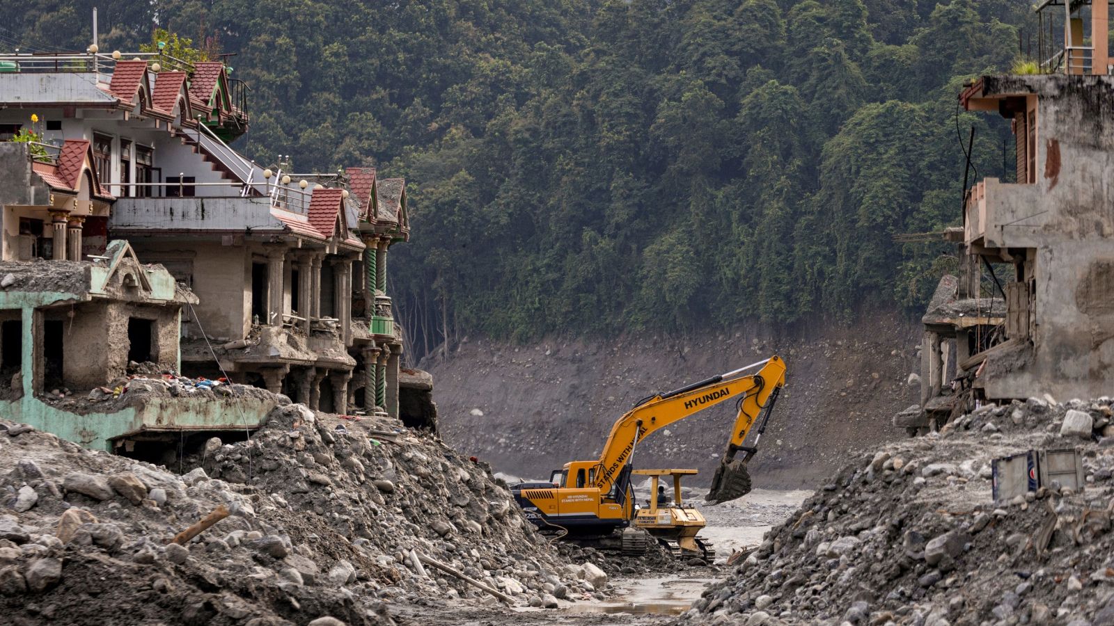 Nepal to amend laws for families of 5,285 flood victims