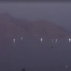 Iran warns of wider conflict as IRGC claims strikes on ships in Persian Gulf