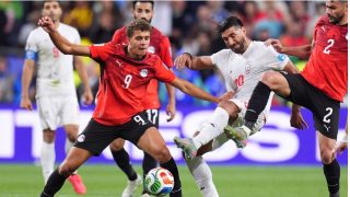 Egypt advances past group stage at the World Cup after a 1-1 draw with Iran