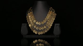 Gold drops ₹2,640 per 10 g, silver slides ₹5,200 on firm rupee, weak global cues