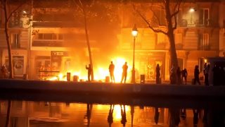 Paris police arrest 855 after clashes and looting during protests