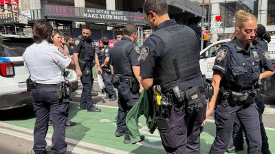 Times Square gunfire sends bystanders scrambling to safety