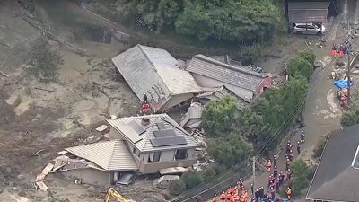 Double storms batter Japan, trigger landslides, mass evacuations