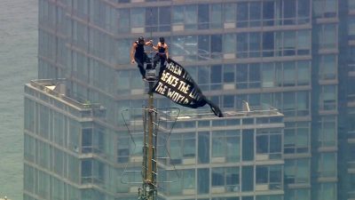 Two arrested after scaling Empire State Building antenna, unfurling 'power of love' banner