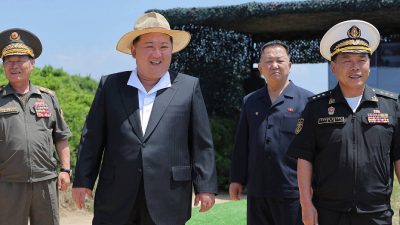 North Korean leader Kim Jong Un observes weapons tests from new naval destroyer