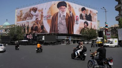 Iran begins late supreme leader's final journey; airspace, streets remain shut