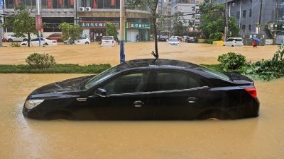 A landslide in China buries 33 people, with about half of them rescued, state media report