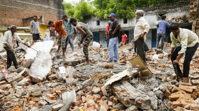 Ahmedabad Municipal Corp begins demolition of 52 illegal properties near Narendra Modi Stadium