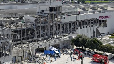 Death toll from Japan quake climbs to 34 as rescuers again search damaged mall