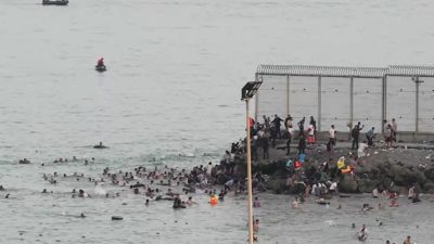 Spain deploys military to Ceuta border after thousands cross from Morocco
