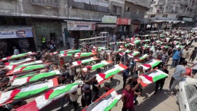 Palestinians hold mass funeral for 112 bodies recovered from Gaza strike