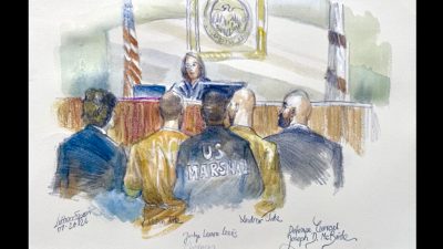 Judge postpones court hearing of Tate brothers as they fight UK extradition