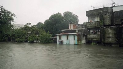Monsoon rains flood Manila homes, submerge roads in northern Philippines