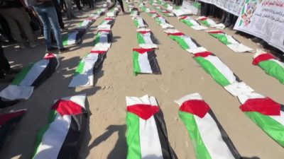 Palestinians hold funeral for 50 recovered bodies in Gaza